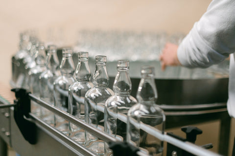 Empty Ferg and Harris bottles on the conveyer belt, en route for bottling